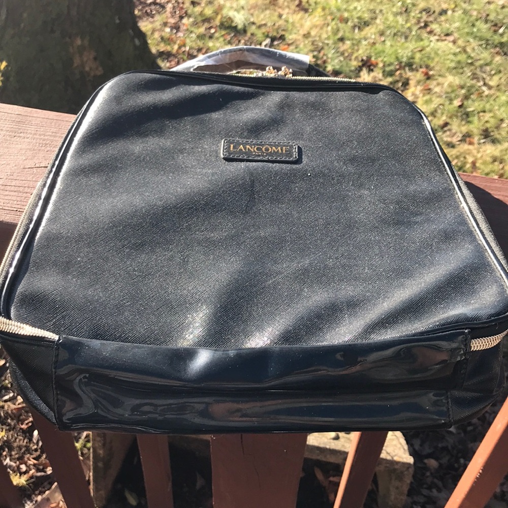 Lancôme cosmetic bag, new with handles wrapped